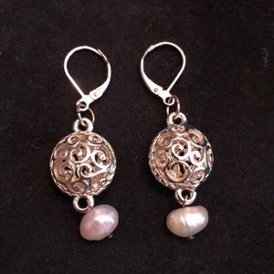 Silver pearl drop earrings.  Swirl silver plated.